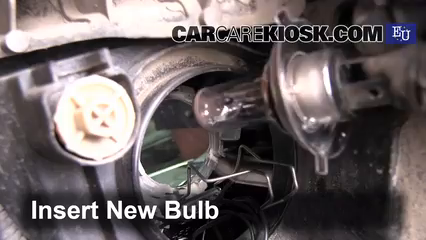how to change headlight bulb on 2010 chevy silverado
